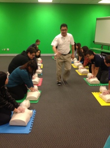 Seneca EVM class practices CPR procedures through Jesus Gomez's instruction  Photo taken by Abi Roman  